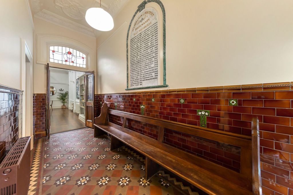 The entrance with original tiles and the marble honour board. Photo: Nelson Alexander Flemington
