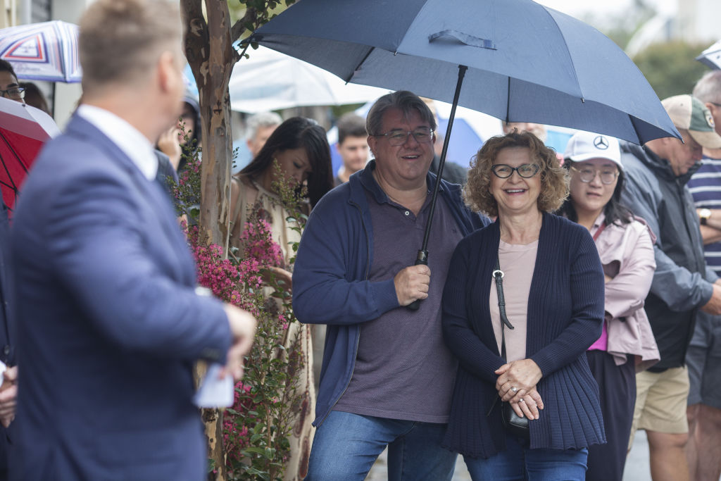 Brenton and Lola during the auction.  Photo: Stephen McKenzie