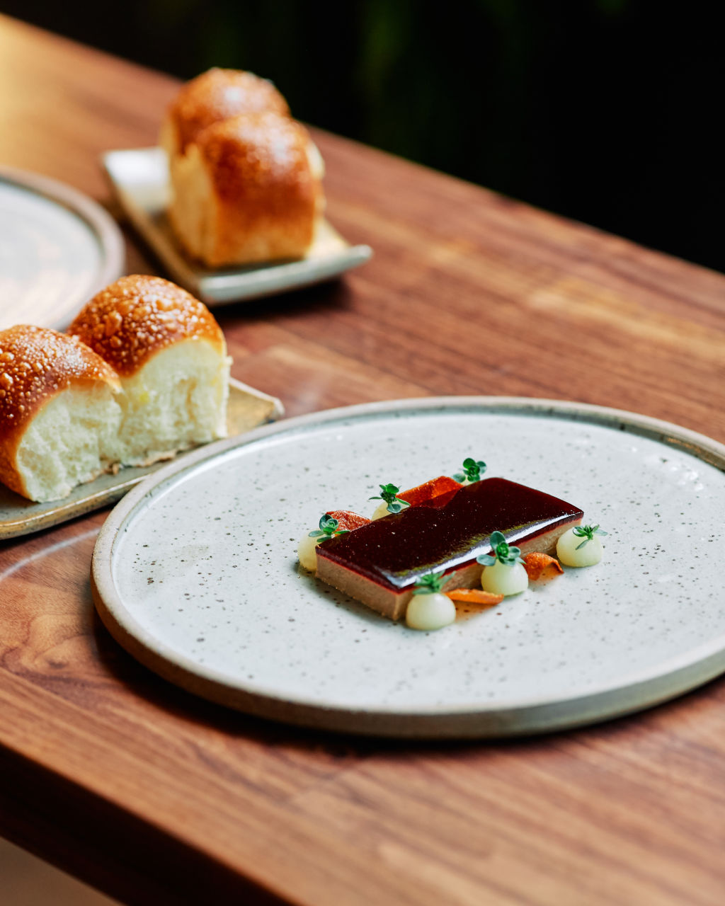 Chicken liver parfait with ruby port glaze comes with shiny milk buns. Photo: Harvard Wang.