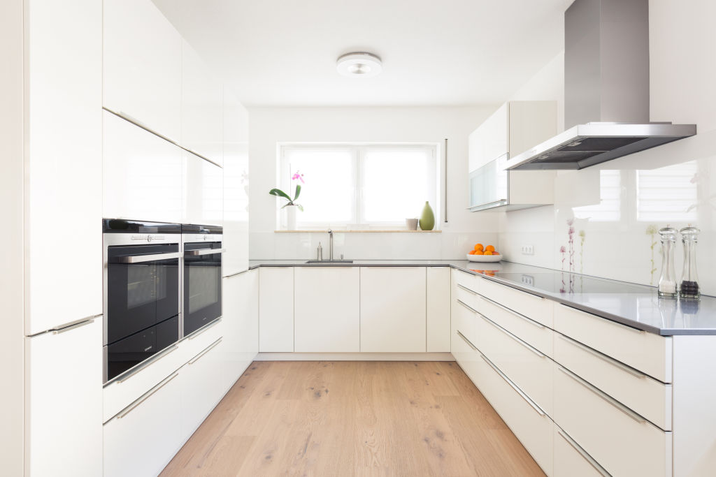Laminate flooring is affordable and durable, making it ideal for renovators on a budget. Photo: iStock