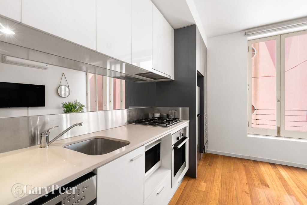 The one-bedroom unit is close to restaurants and the beach. Photo: Gary Peer