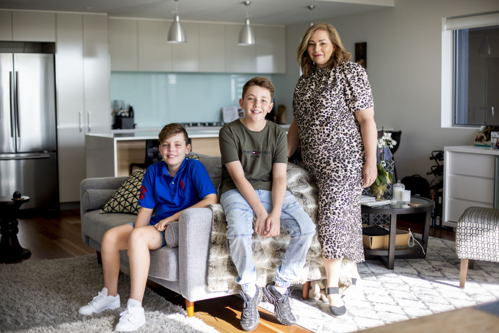 Aidan, Dylan and Melissa Williams in their Indooroopilly apartment. Photo: Tammy Law