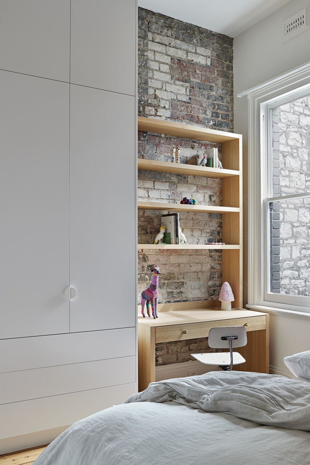 Exposed lettering behind the cupboard. Photo: Shannon McGrath