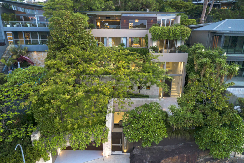 The three-level residence designed by architect Phil Corben was commissioned by the Hadleys.