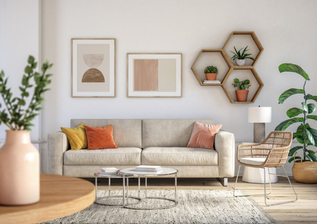 Compact living spaces are better off with sofas that are positioned flush against the wall. Photo: iStock