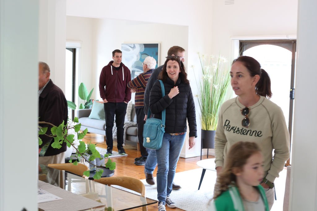Buyers and onlookers were mostly undeterred.  Photo: Stephen McKenzie