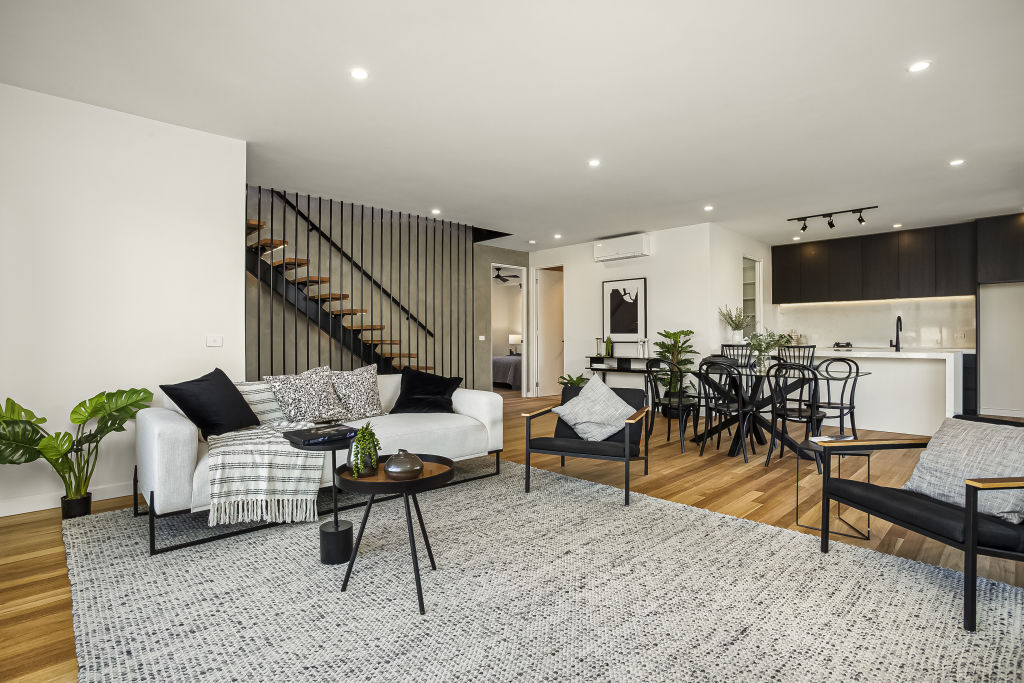 The expansive living, dining and kitchen space. Photo: Brad Teal