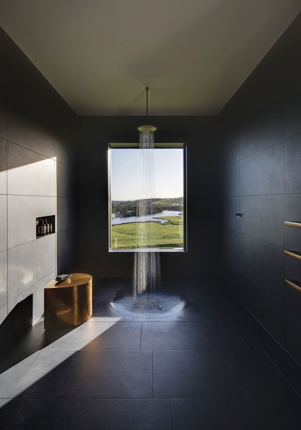 The Headland’s bathrooms are dark and cave-like, and protected from the elements. Photo: Michael Nicholson. Architect: Atelier Andy Carson
