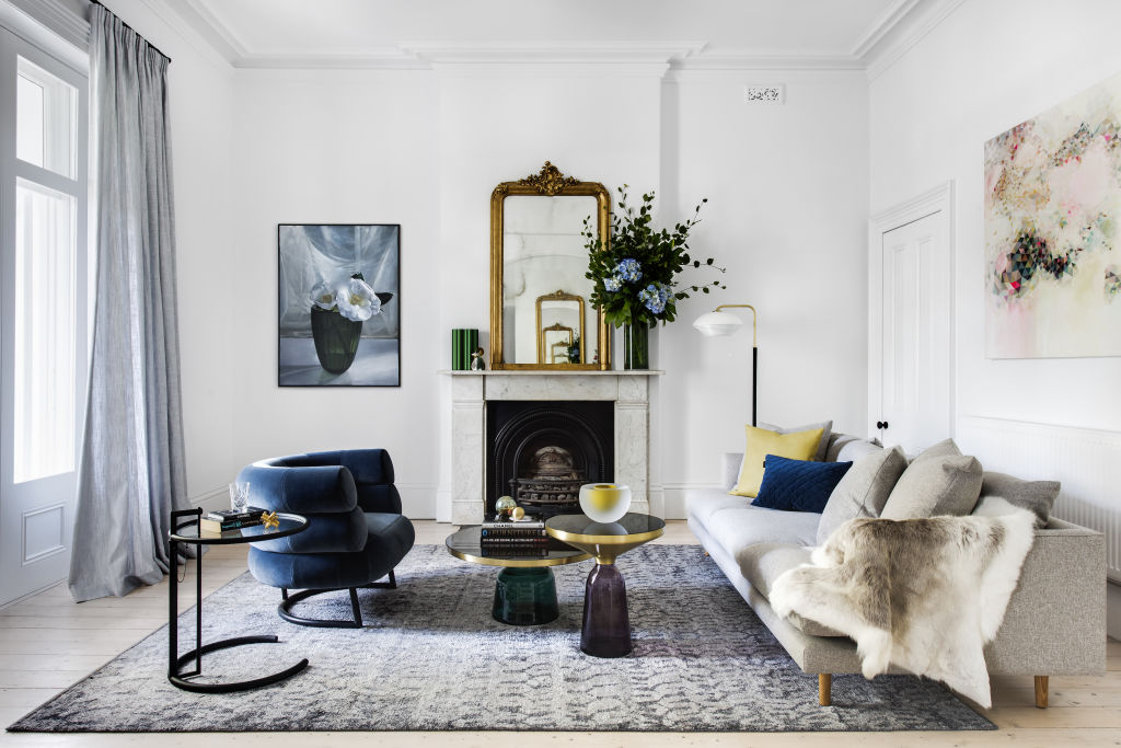 A large rug over floorboards can help dampen sound. Photo: Nicole England. Clark House – Artwork: Julie Davidson. Architect & interiors: SJB. Styling: Swee Design