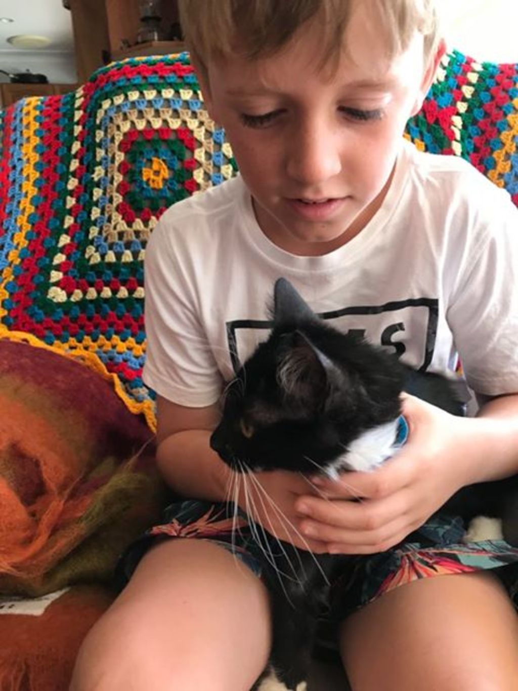 Louise Coleman’s eight-year-old son Xavier and pet cat Leonardo.