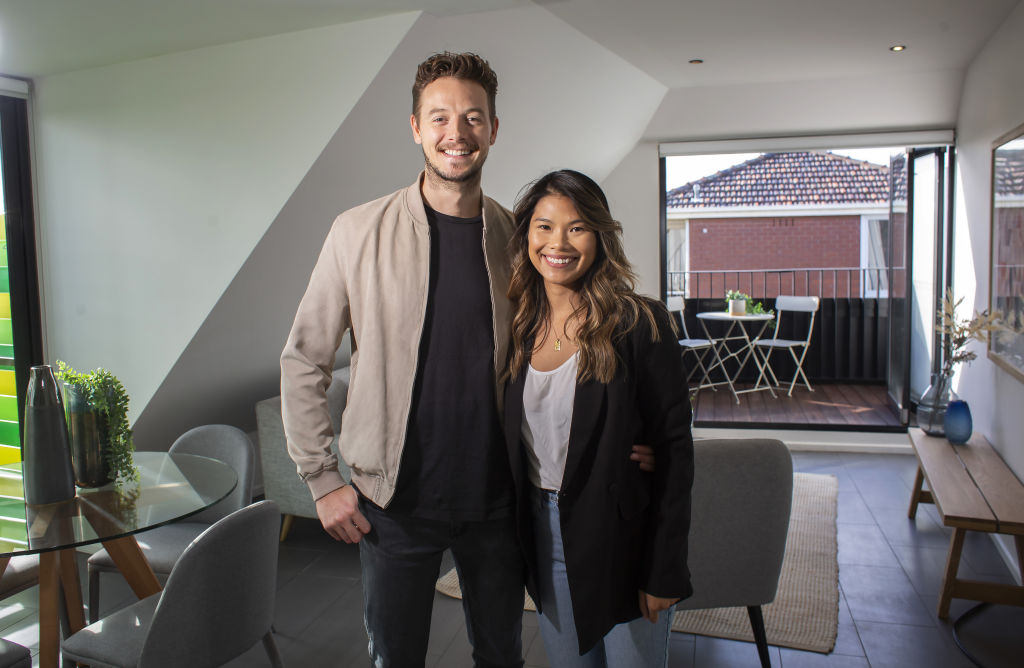 Jack Bishop and Victoria Weeraphan, first-home buyers, at their new apartment. Photo: Stephen McKenzie
