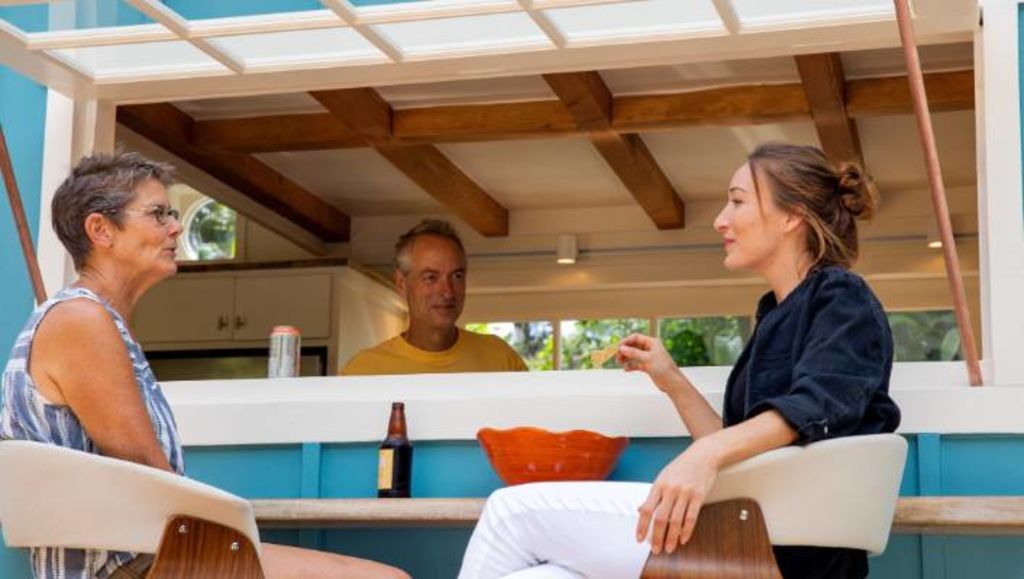 Friends and family love to gather at the outdoor bar in the late afternoon. Photo: Paradise Tiny Homes