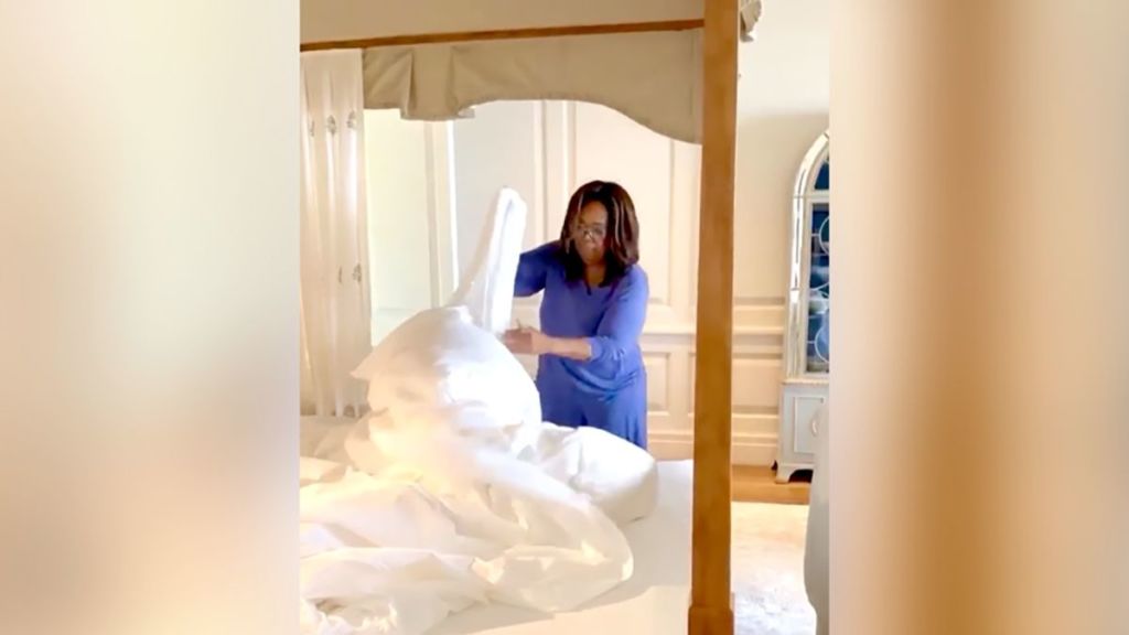 Oprah struggles to change her own duvet during lockdown