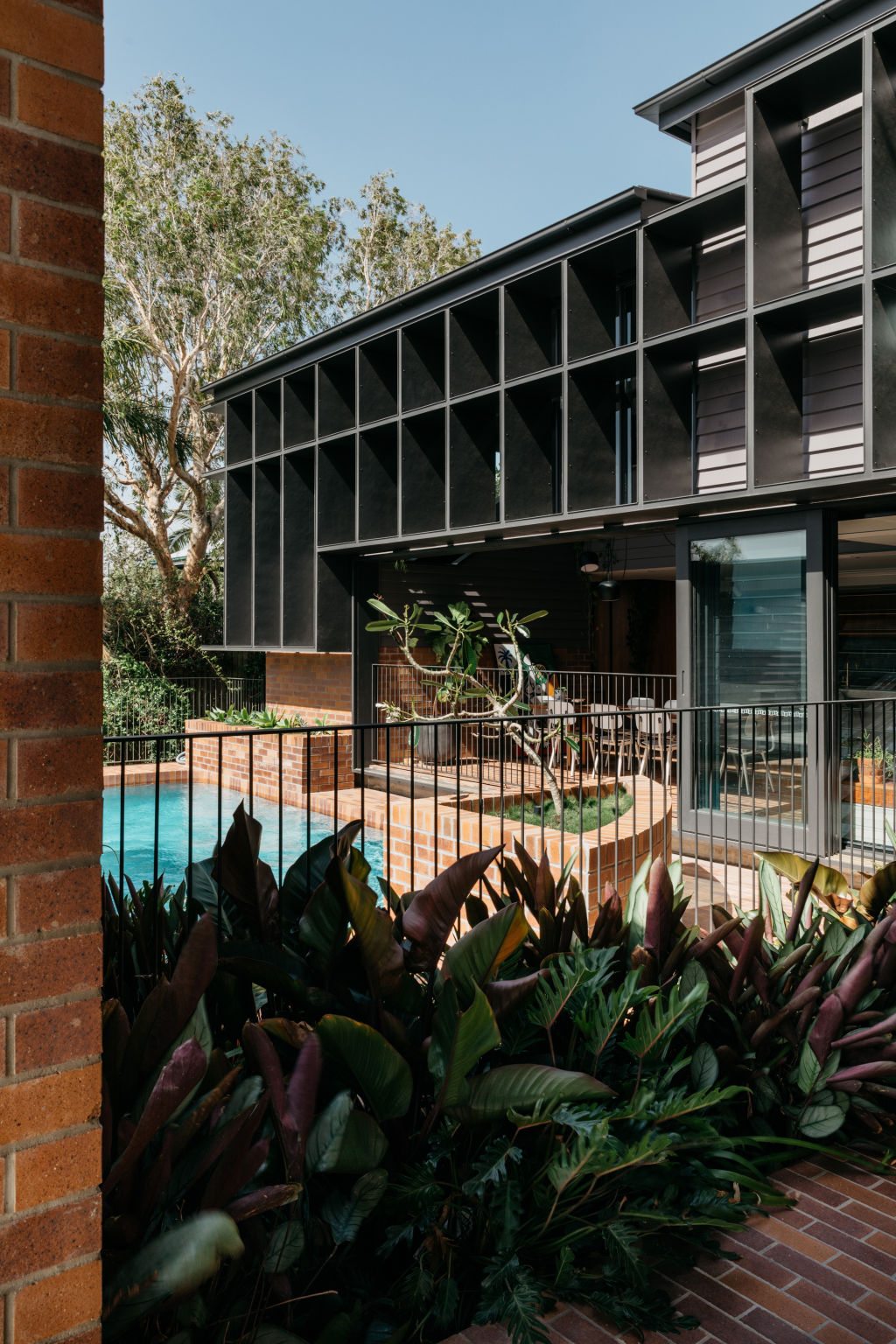 The gridded rear facade of the Wooloowin house. Photo: Shantanu Starick