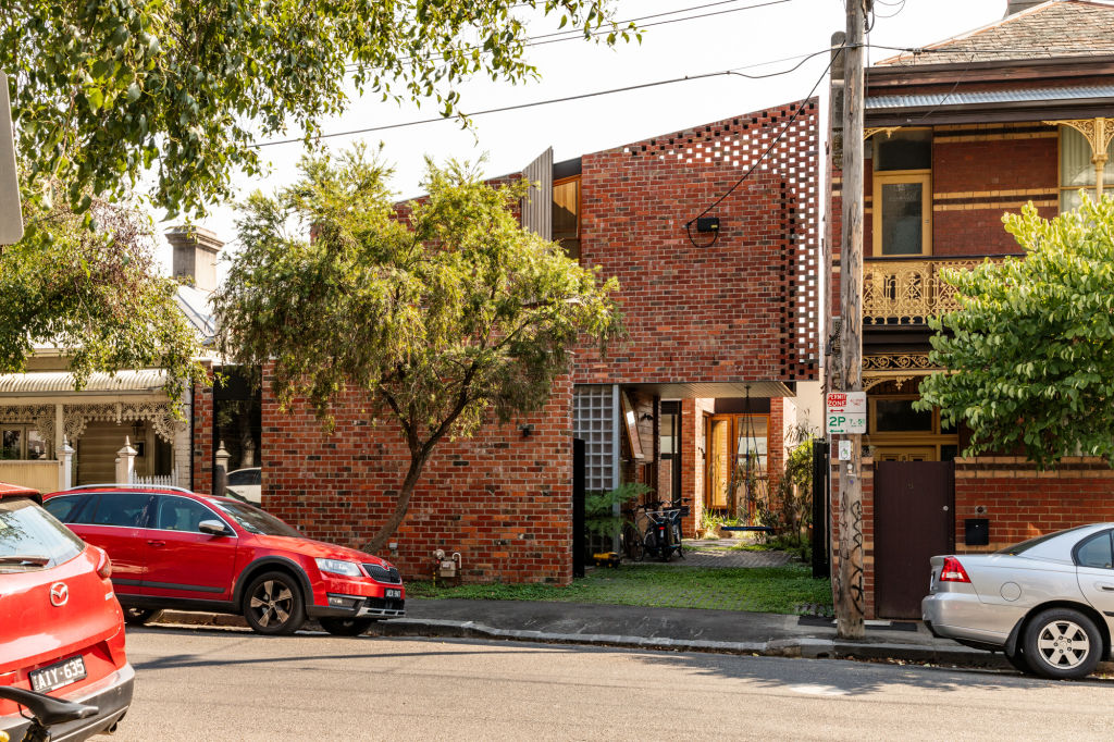 The Richmond property is set between a single-storey cottage and a double-level heritage brick terrace. Photo: Trevor Mein