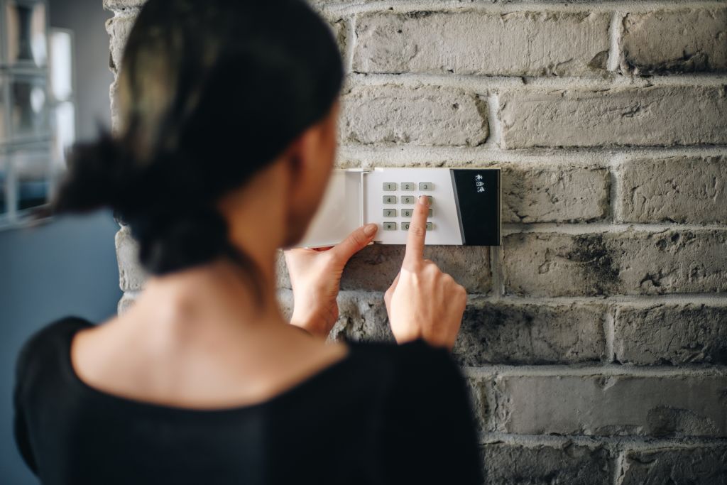 Installing security systems can help minimise risk and therefore reduce your premium. Photo: iStock