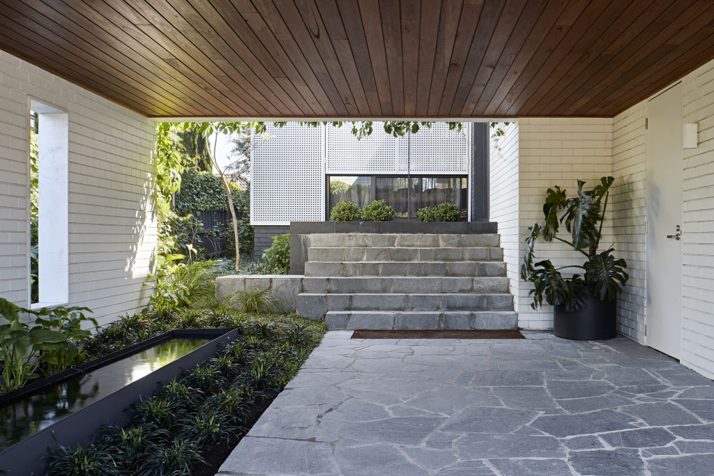 Enter here through the undercroft landscape by Eckersley Garden Architecture. Photo: Shannon McGrath