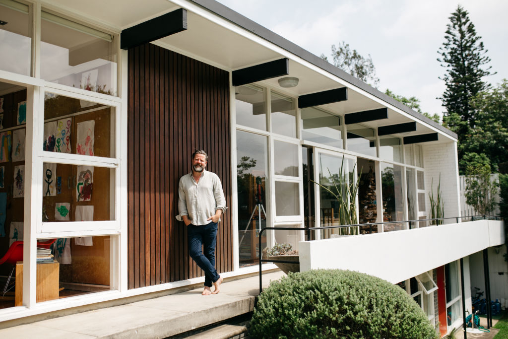 Tim Ross lives in a mid-century home in Sydney with wife Michelle Glew and their sons Bugsy and Bobby.  Photo: Rachel Kara