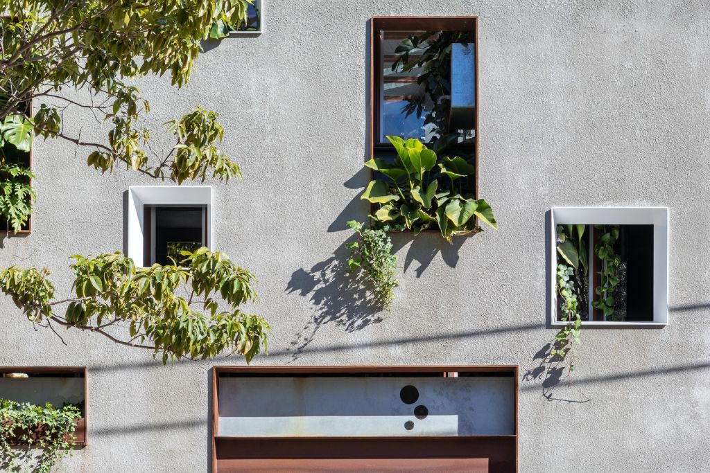 The home features the facade of an old warehouse. Photo: Murray Fredericks