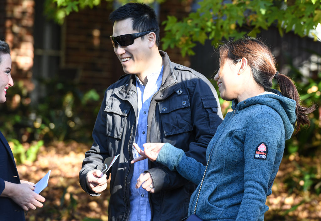 The selling agent Catherine Murphy with the happy buyers after they placed the winning bid. Photo: Peter Rae