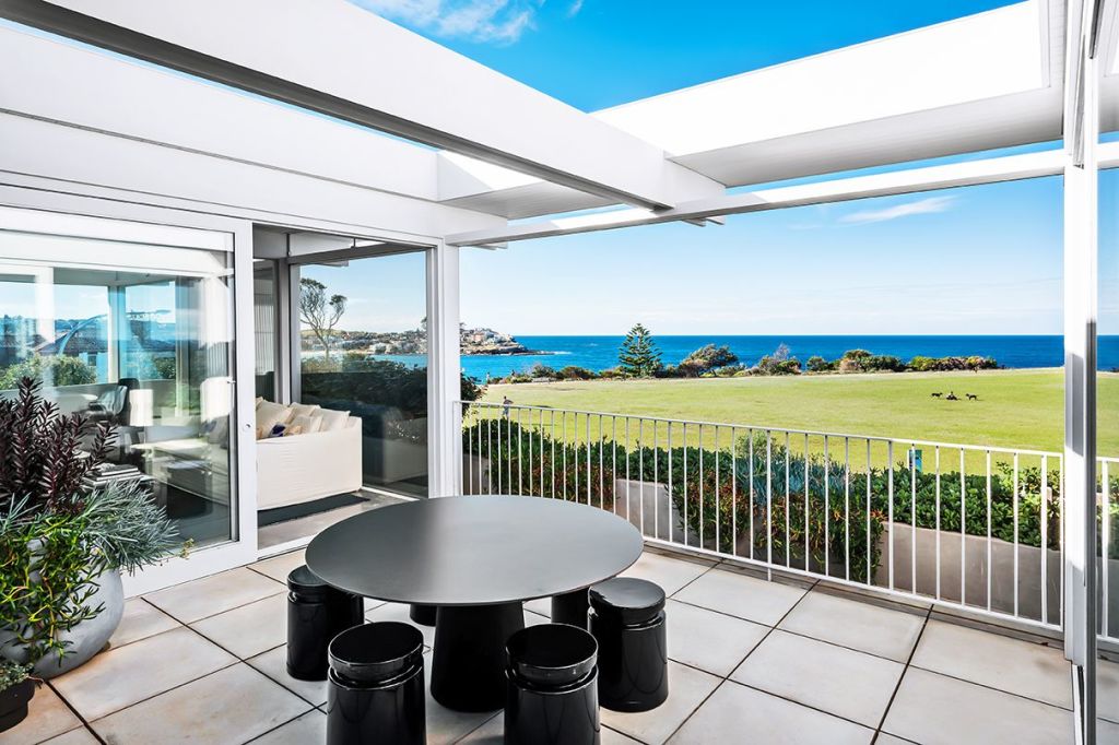 The three-level residence is set on 250 square metres fronting the oceanfront park.