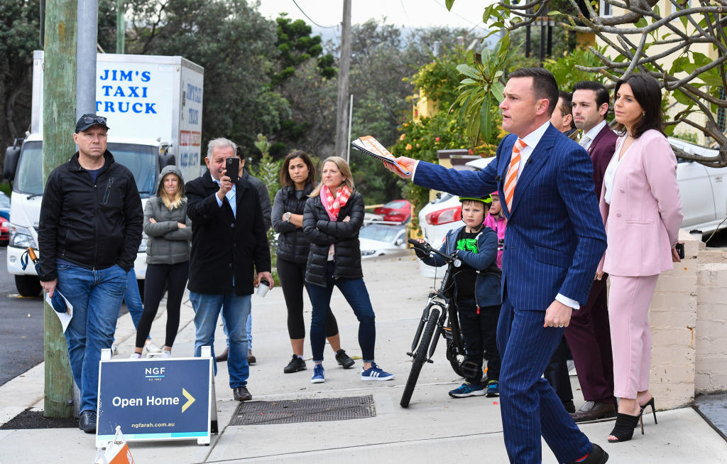 Damien Cooley, of Cooley Auctions, in action at an eastern suburbs home earlier this year. Photo: Peter Rae