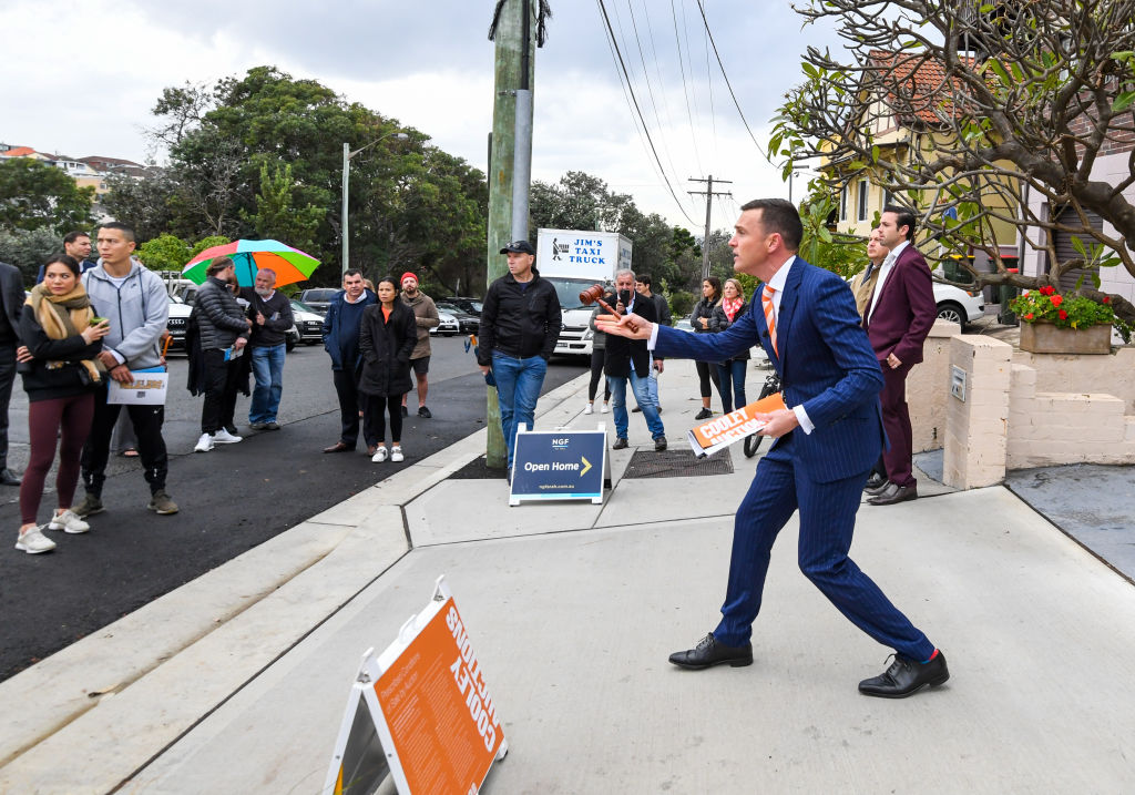 Six of the seven registered buyers vied for the keys to the two-bedroom apartment. Photo: Peter Rae