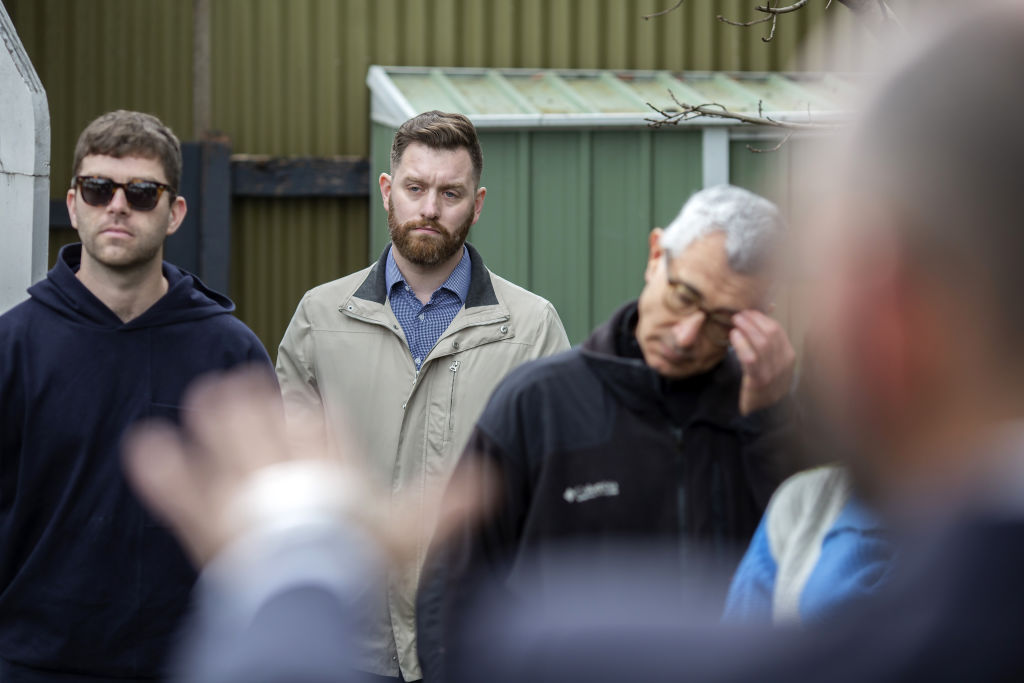 The buyer (centre) was a buyers' advocate, working on the behalf of an investor. Photo: Stephen McKenzie