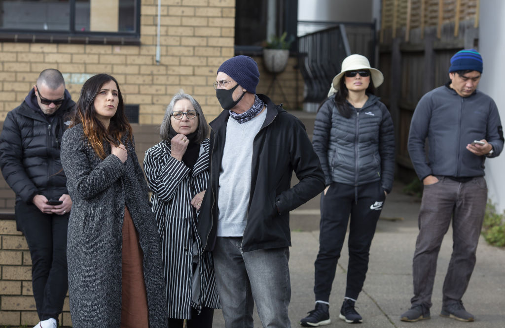 A small crowd was hanging around the property ahead of the auction.  Photo: Stephen McKenzie