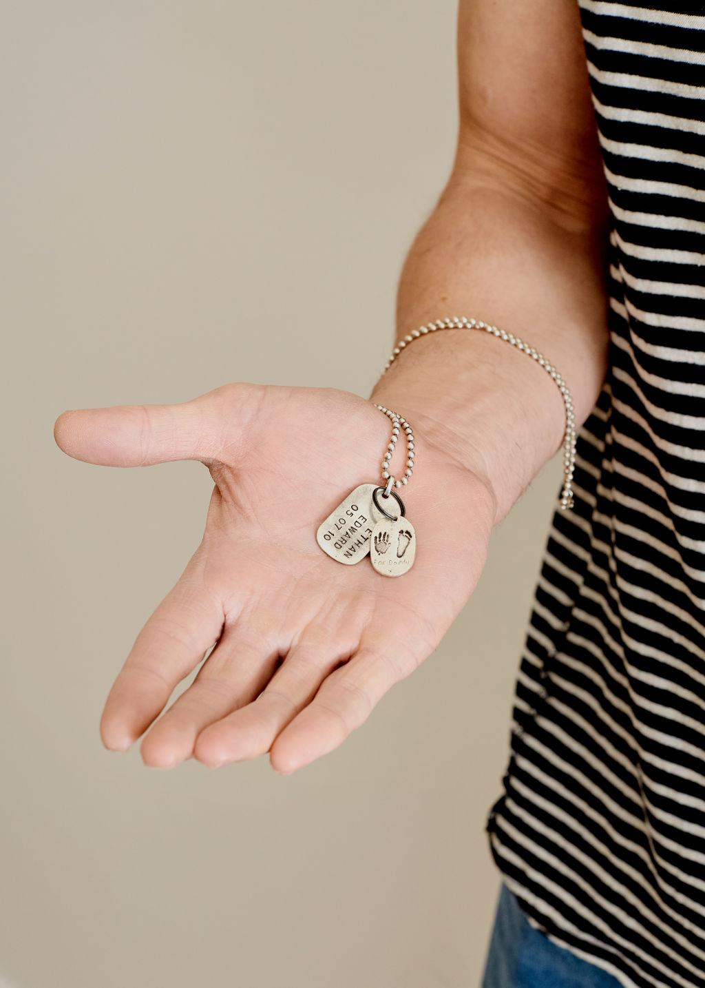 'The dog tags are a gift for the birth of my son Ethan.' Photo: Amelia Stanwix