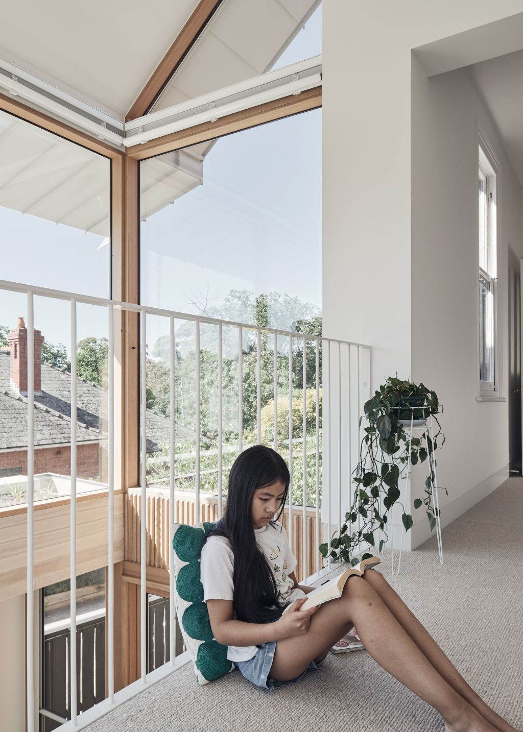Mindfulness moments: an internal balcony designed to keep the children out of their bedrooms. Photo: Peter Bennetts
