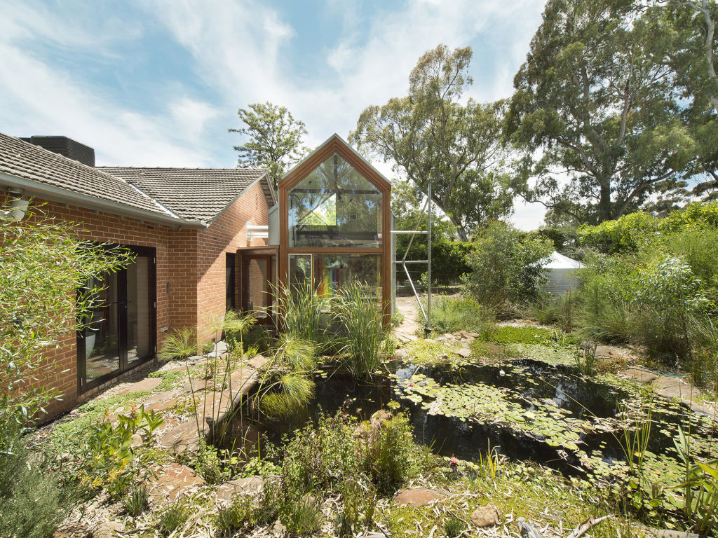 The design features a pond and creates its own micro-climate. Photo: John Adam