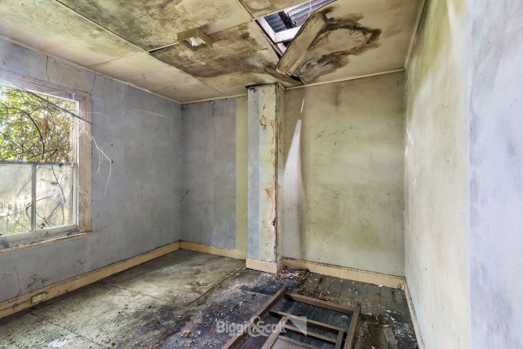 There is cracking throughout the home and the listing notes the ceilings are at risk of collapse.