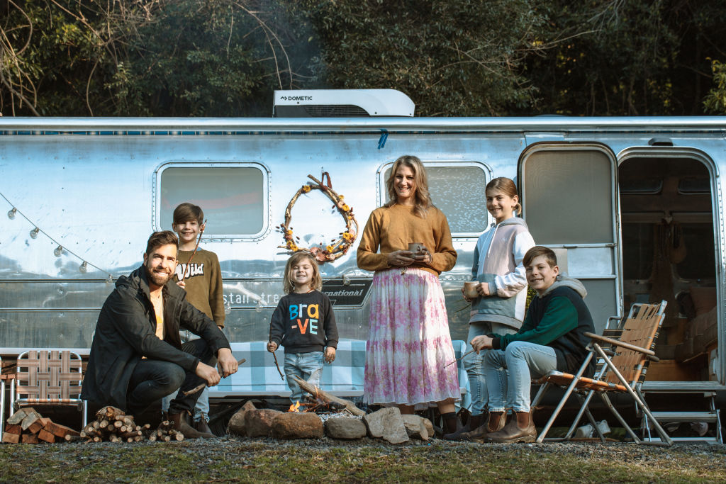 This family of six lives in a vintage Airstream next to their house