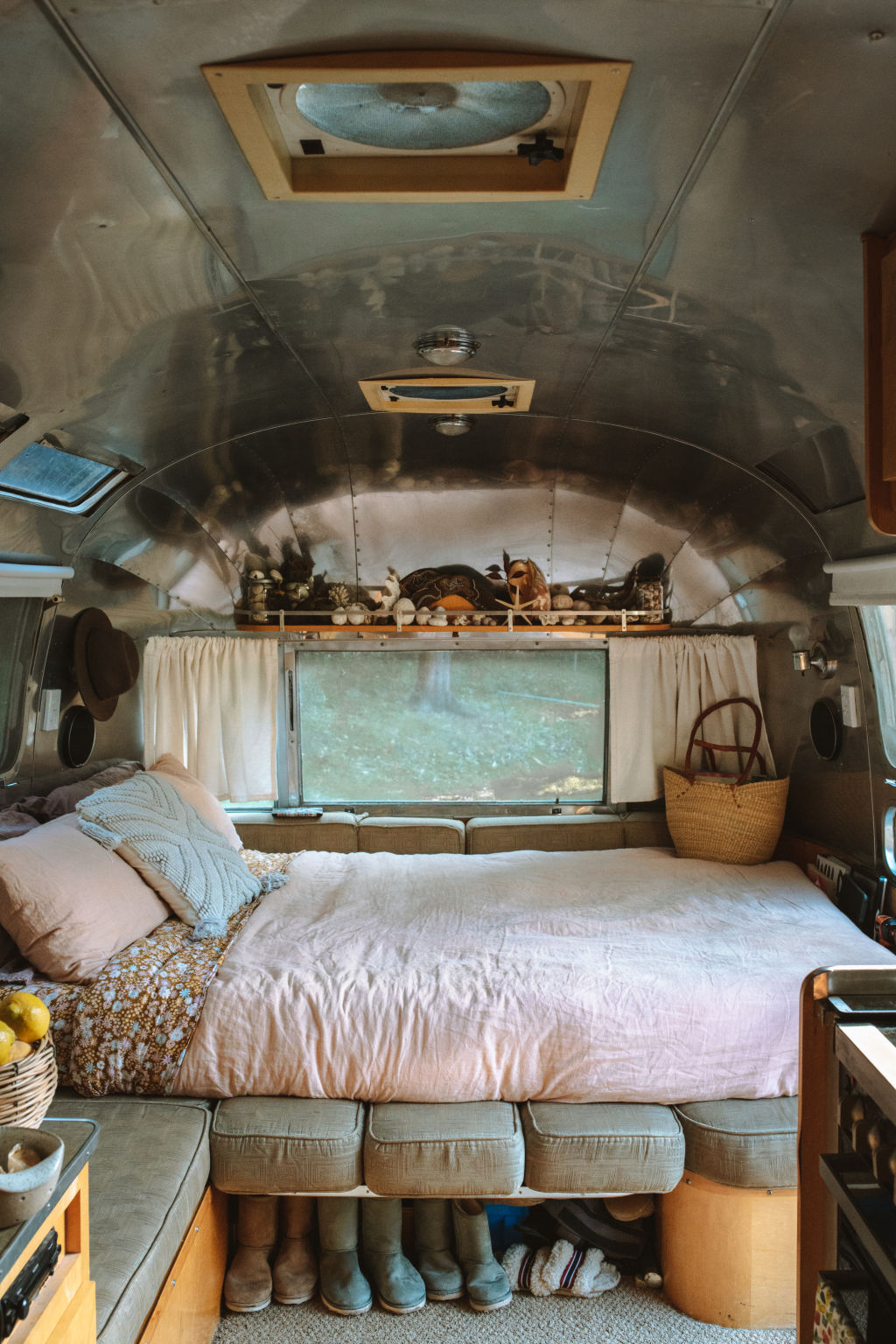 Kylie and Nathan’s bed sits near the front of the van, close to the kitchen area.  Photo: Vaida Savickaite