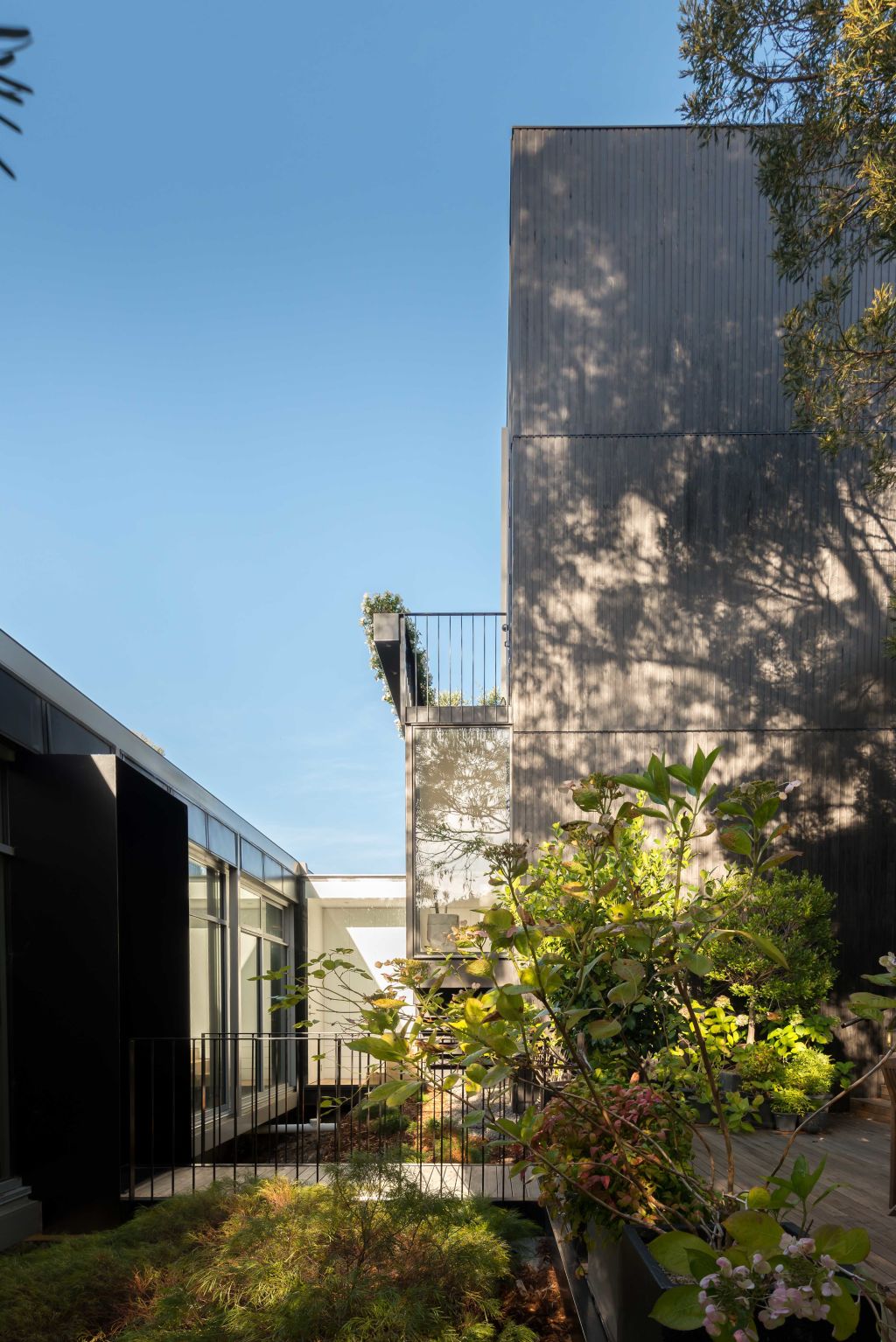 A connected but self-contained home is chic housing for a family matriarch. Photo: Matt Sansom