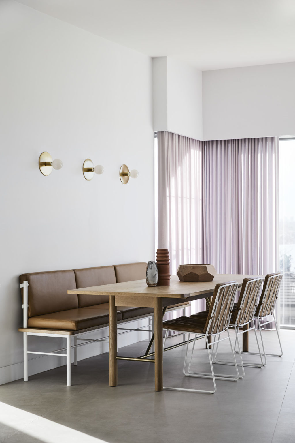 Kritzler is a fan of custom banquette seat on one side of the table with chairs on the other. Photo: Sharyn Cairns