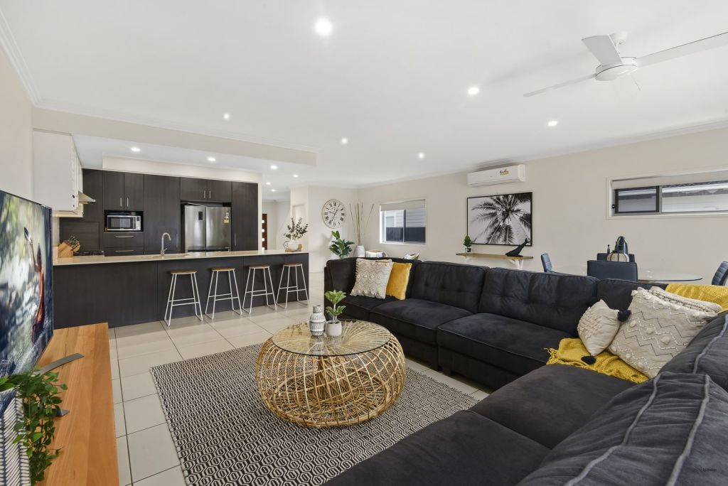 The open-plan living and dining zone. Photo: LJ Hooker