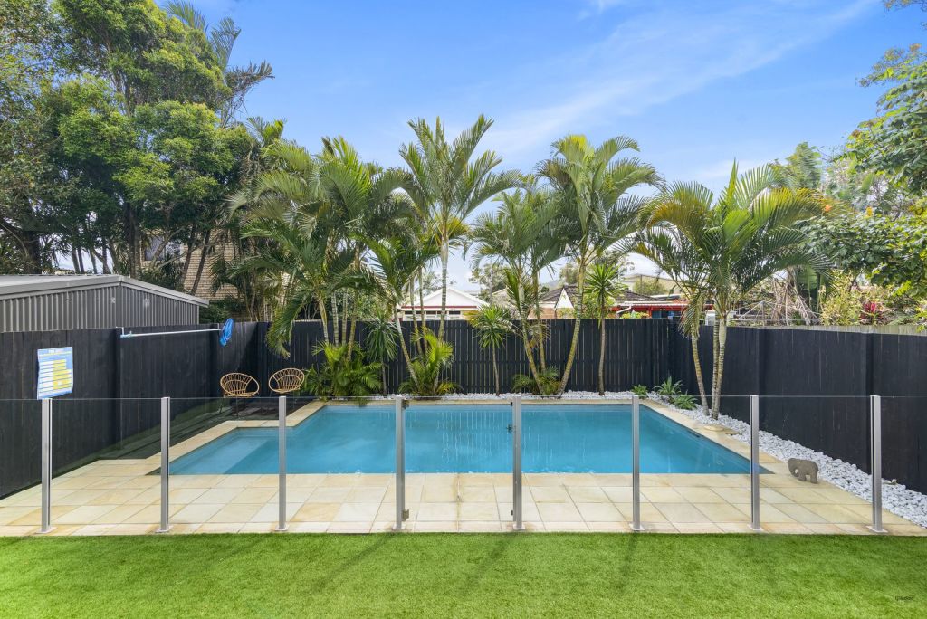The low-maintenance yard and in-ground pool. Photo: LJ Hooker