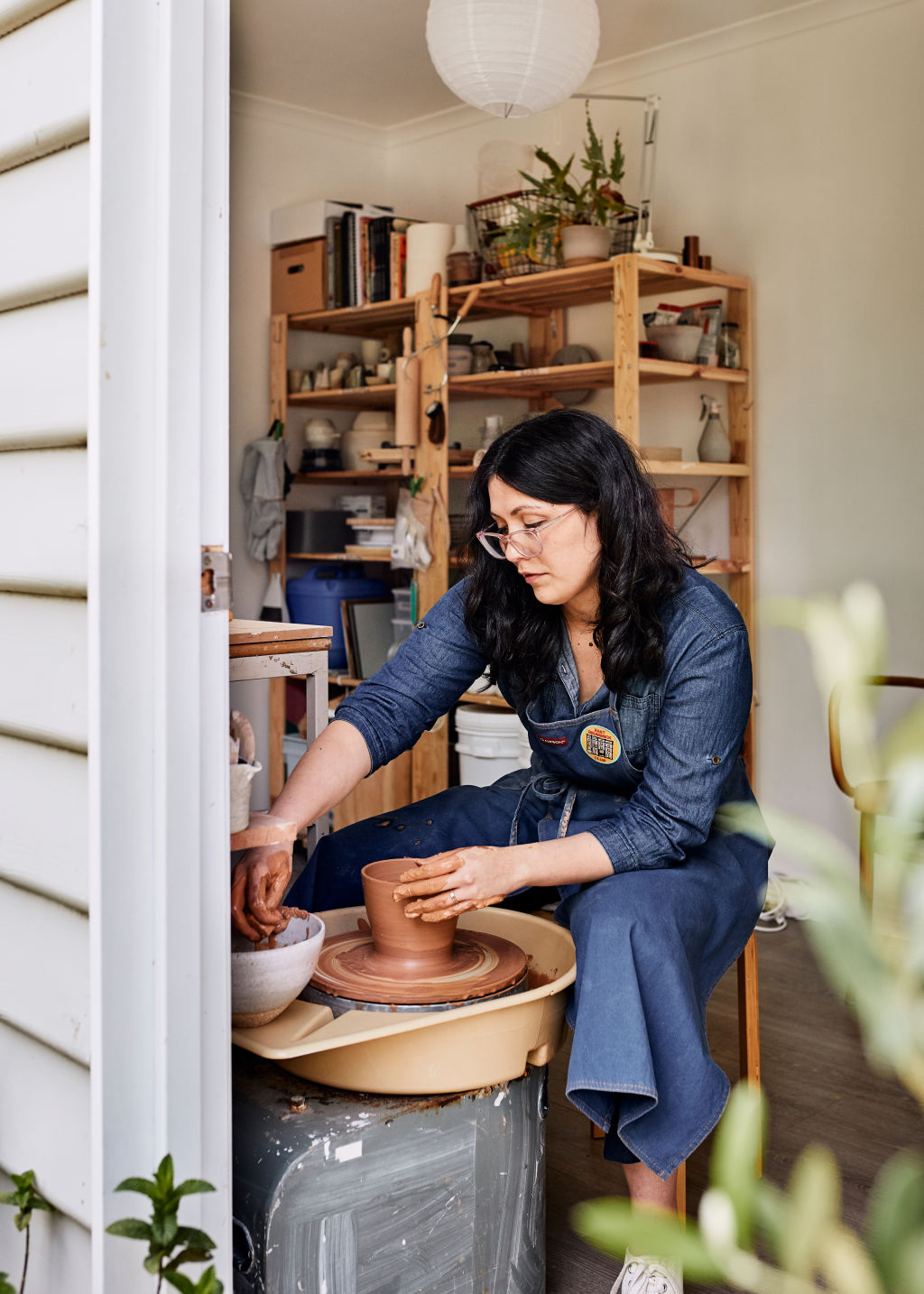 Cassie Hansen is a part-time editor of Artichoke magazine who has taken to the pottery wheel all in the name of chasing her own creative aspirations. Photo: Amelia Stanwix