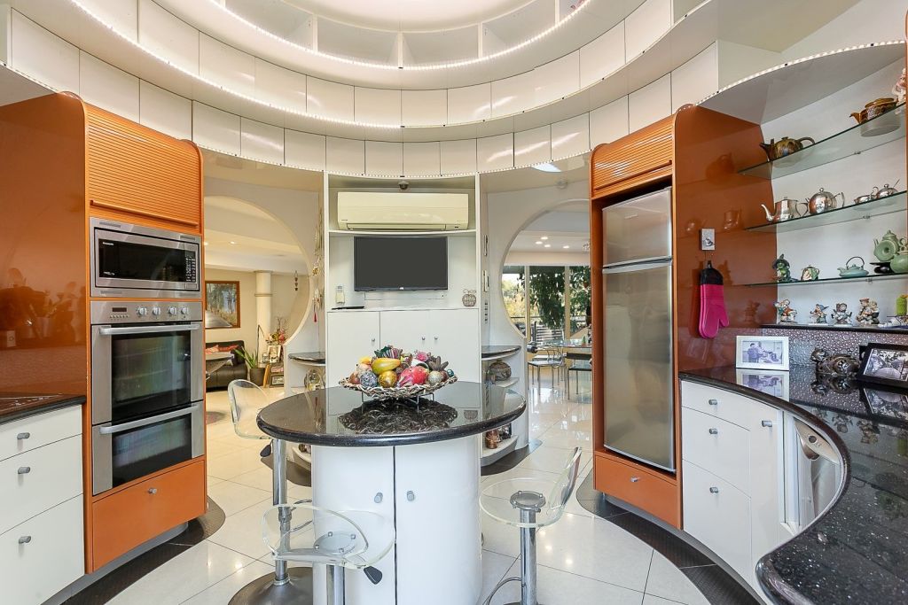 The owners thought outside the box, creating a round kitchen to go in their bubble home.