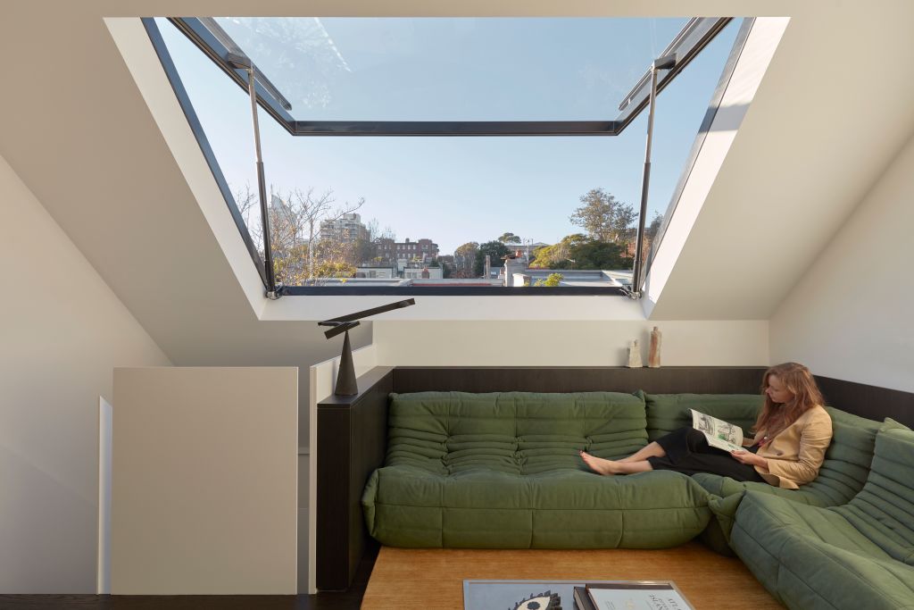 The attic living space didn't exist before but now it works like a sunroom. Photo: Tom Ross