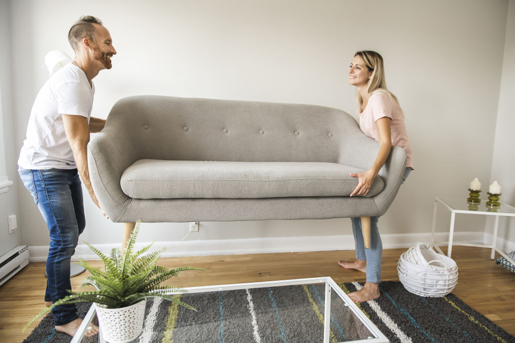 Measure the width and depth of your couch to ensure it will fit nicely in your space. Photo: iStock