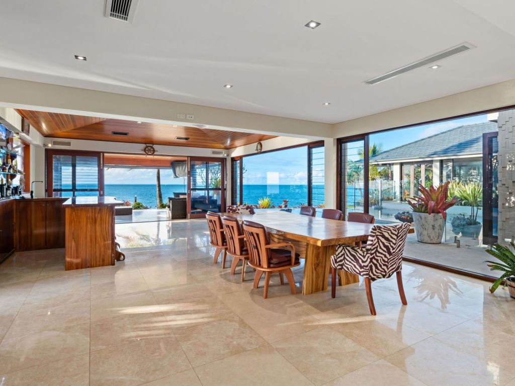 Glass panelling takes advantage of the outlook. Photo: McGrath Bayside Cleveland