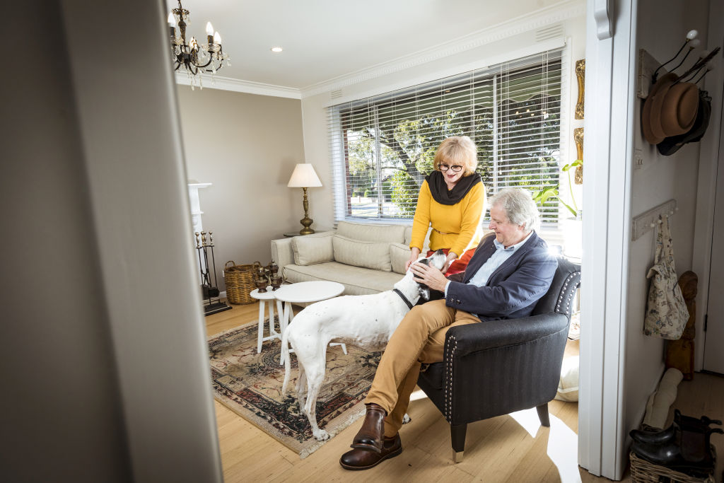 Goska (L) and Janusz Wolnik have their Dandenong home on the market and are waiting for restrictions to lift so they can begin inspections for the upcoming auction. Photo: Christopher Hopkins