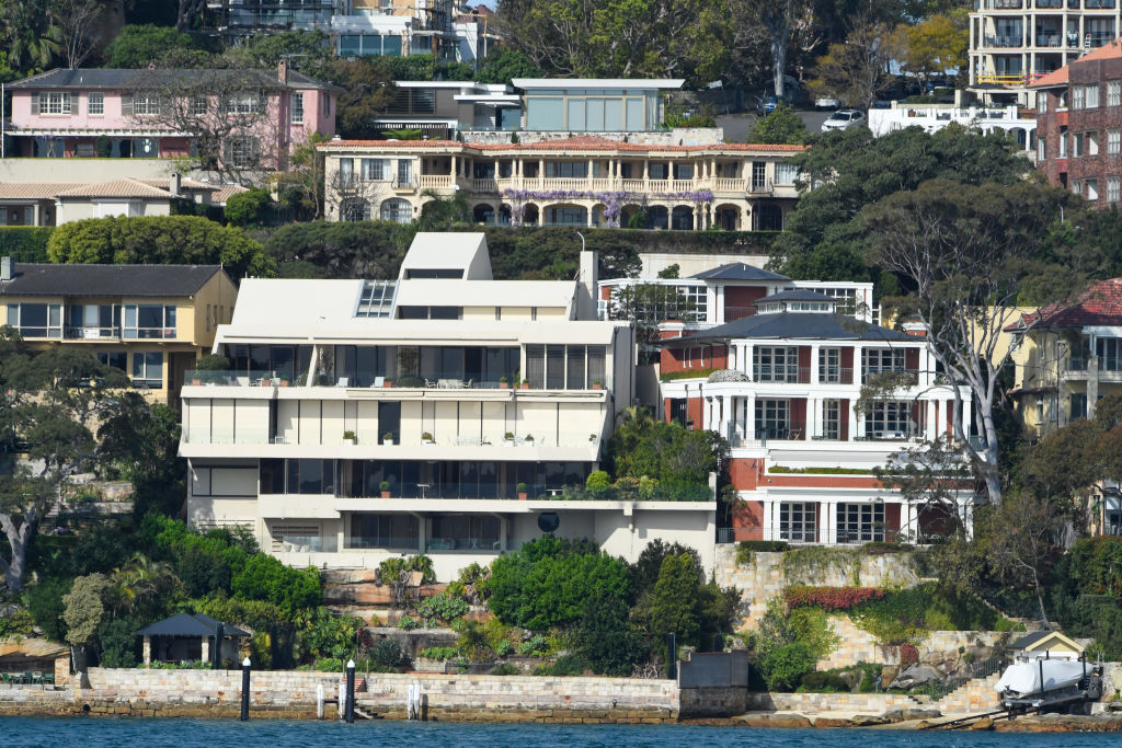 Edgewater was converted into a duplex in the 1980s and claims one of the few harbourfront tennis courts in Point Piper. Photo: Peter Rae