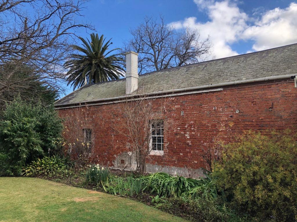 Colonia- era brickwork will remain visible at the rear of coach house and laundry. Photo: National Trust Victoria