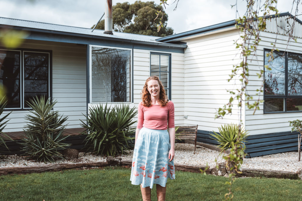 Julia Groves outside her three-bedroom weatherboard house in Mirboo North, 156 kilometres south-east of Melbourne. Photo: Nicky Cawood