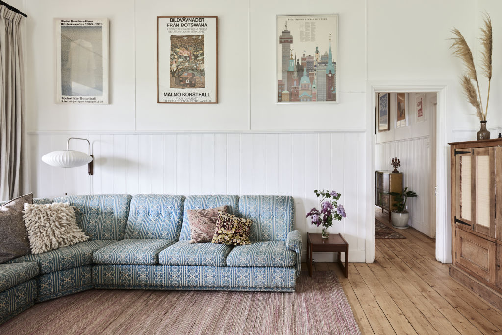 The lounge area features whitewashed walls and Baltic pine floorboards. Styling: Annie Portelli. Photo: Eve Wilson