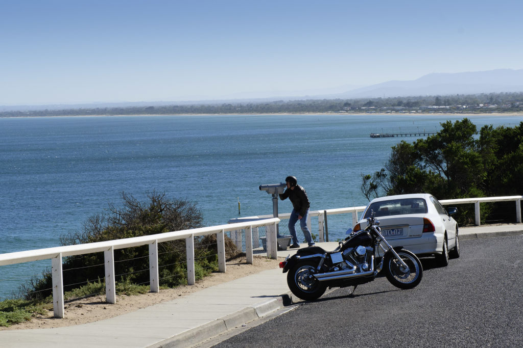 Taking in the sensational view at the Olivers Hill lookout in Frankston South. Photo: Vince Caligiuri